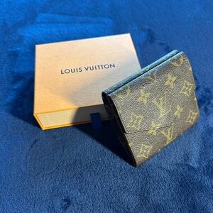 Louis Vuitton Monnaie Double Snap Wallet